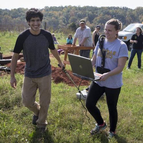 Randolph College students take seismograph readings for an archeology dig.